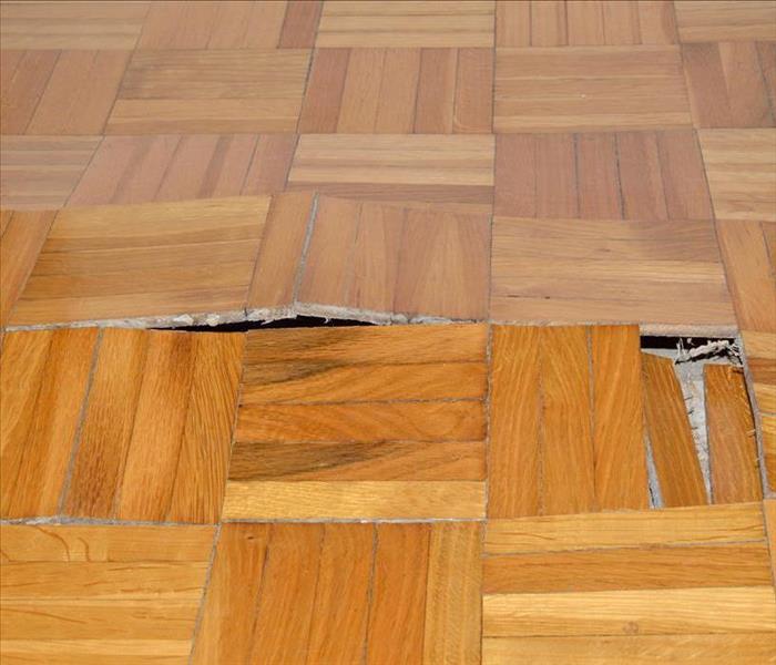 buckling floor from water damage